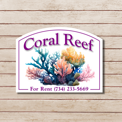 beach house sign with color water graphics